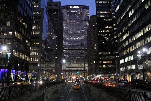MetLife Building, view from the South Park Avenue in the night illumination, New York, NY, USA