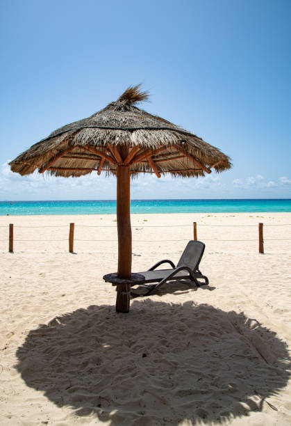 istock Single Chair at Cancun Beach 1306567928
