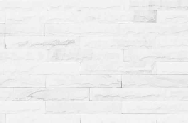 istock White grunge brick wall texture background for stone tile block painted in grey light color wallpaper modern interior and exterior and room backdrop design 1306568836