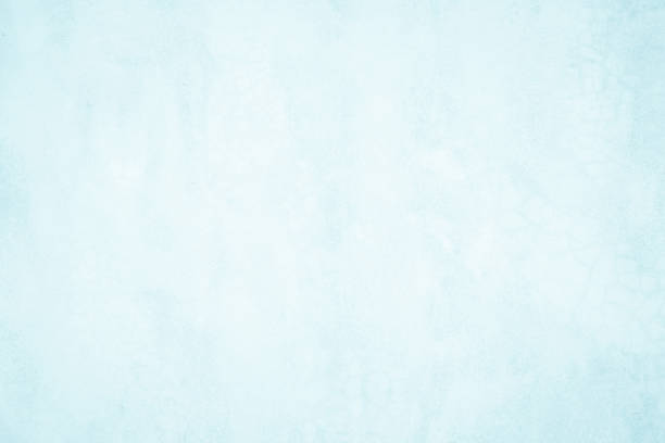 istock Pastel Blue and White concrete stone texture for background in summer wallpaper. Cement and sand wall of tone vintage. Concrete abstract wall of light cyan color, cement texture mint green for design. 1306569083