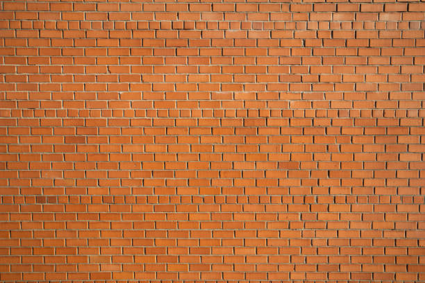 istock A close up of a red brick wall 1306571083