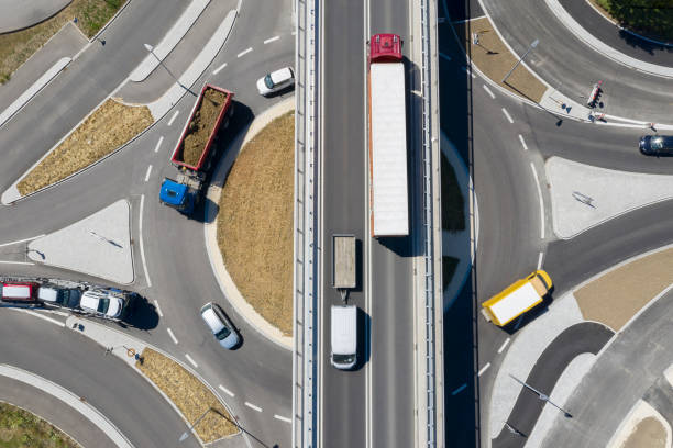 istock Traffic Circle and Road Bridge, Aerial View 1306576370