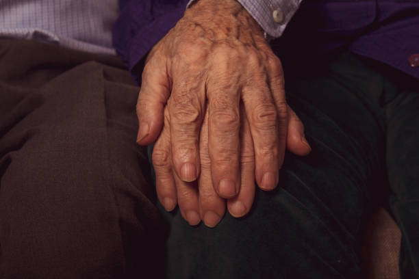 istock Aged hands. Support in old marriage couple. 1306585281