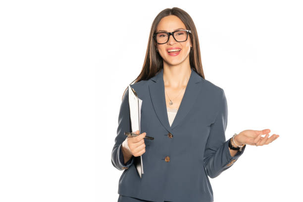 istock Young happy business woman with note book 1306585547