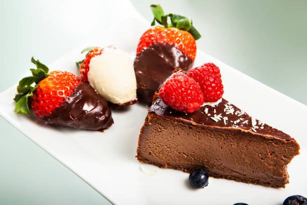 istock slice of chocolate cheesecake with strawberries 1306585569