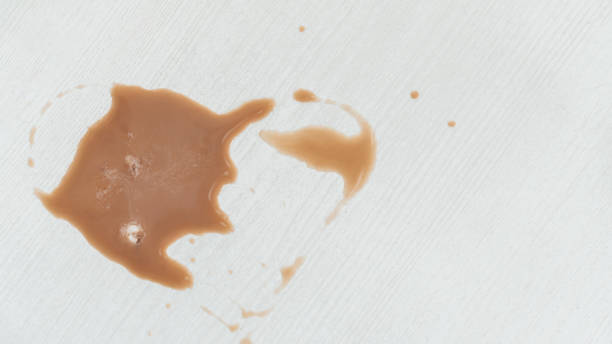 istock Drip coffee water on a white table made in a brown heart shape. 1306586267