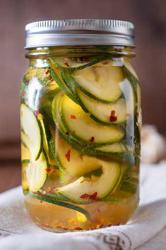 Pickled Zucchini in a Mason Jar with Dill, Crushed Red Pepper and Garlic