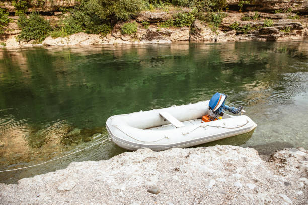 istock Rubber boat moored to the shore 1306598196