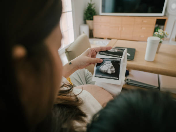 istock Pregnant mother and child. 1306612819