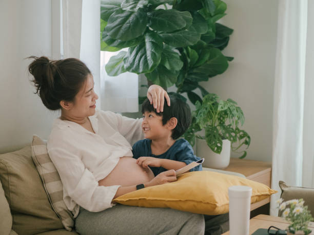 istock Asian sibling with woman pregnant 1306612877