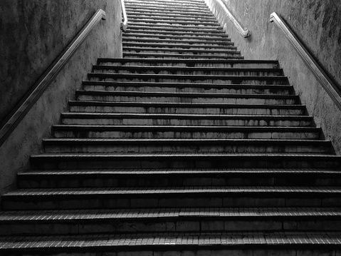 Grungy stairways at the entrance of a Bucharest subway station.