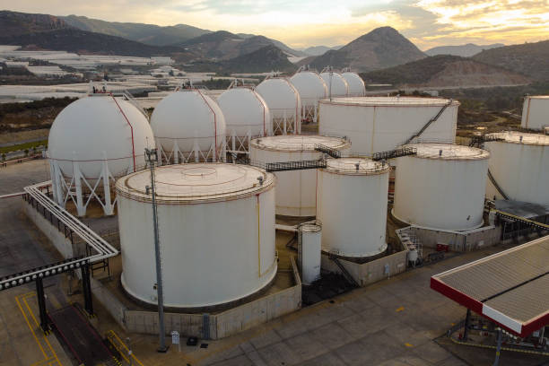 Storage tanks for liquefied natural gas Liquified natural gas storage. LNG or LPG gas plant. Storage tanks for liquefied gas. Aerial view lng liquid natural gas stock pictures, royalty-free photos & images
