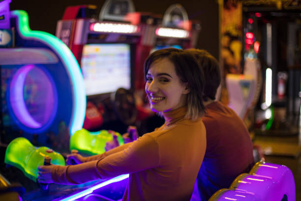 istock Couple having fun in playroom. Playing a games. 1306620752