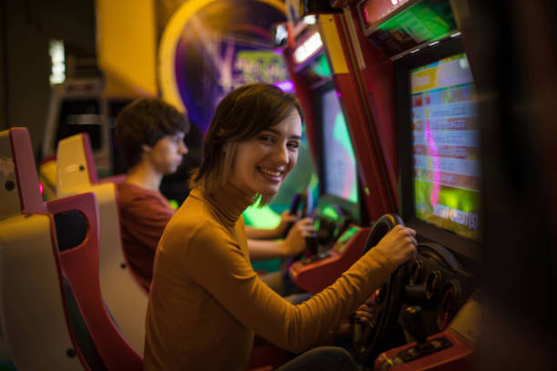 istock Couple having fun in playroom. Playing a games. 1306620795