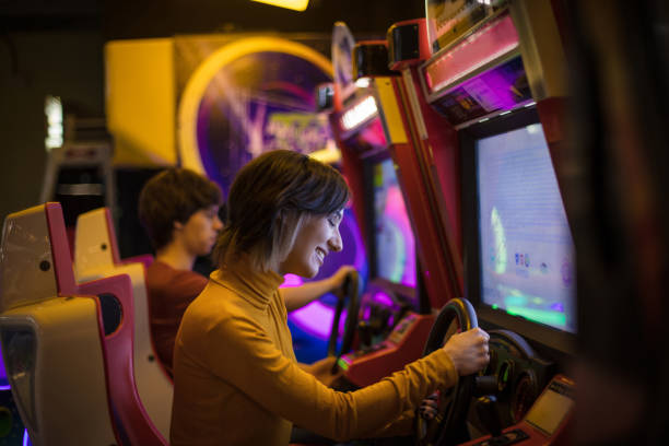 istock Couple having fun in playroom. Playing a games. 1306620799