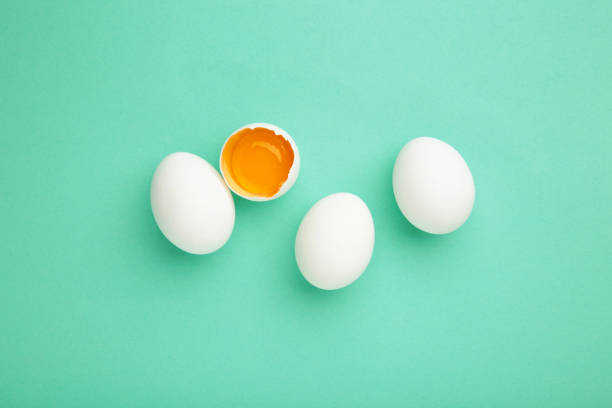 istock Easter decoration white eggs on mint background, minimal design with space for text 1306622795