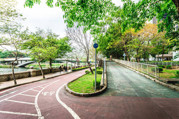 istock Red bike lane in a park 1306624170