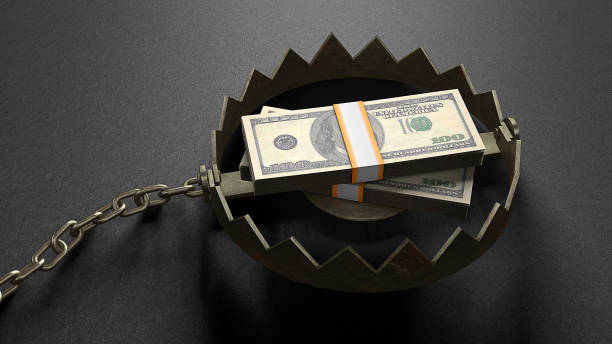istock Stack of money dollars as bait inside the trap 1306629977