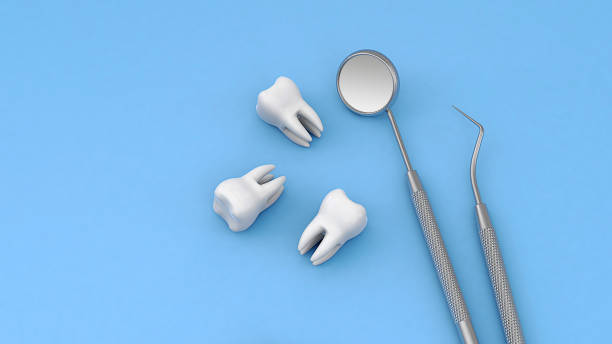 istock Teeth and dental instrument 1306630017