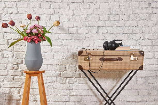 istock modern home living room white wall with wooden stool 1306631583