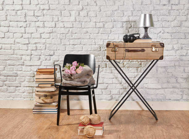 istock modern home living room white wall with wooden stool 1306631607