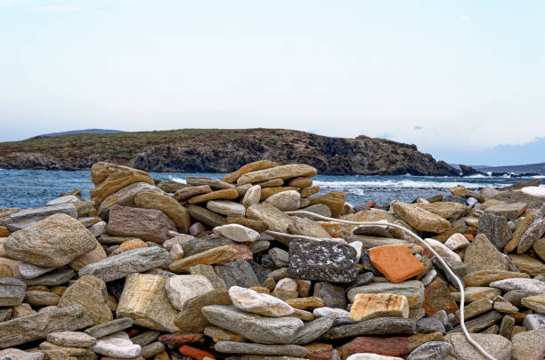 Stony beach in Delos island - Cyclades Aegean sea - Greece - Europe