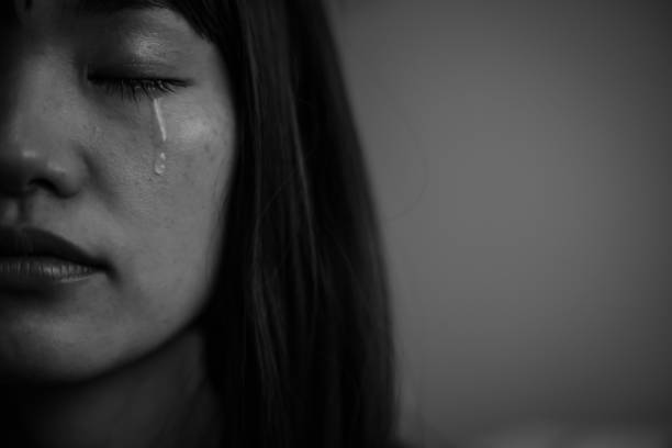istock Woman shedding tears 1306635531