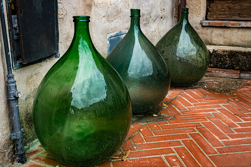 Huge empty old wine jars closeup. Produce of wine in Italy, chianti region, Tuscany