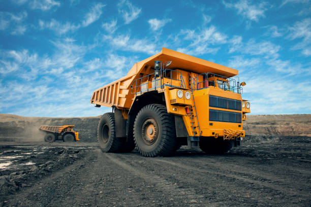 istock A large quarry dump truck in a coal mine. Loading coal into body work truck. Mining equipment for the transportation of minerals. 1306638972