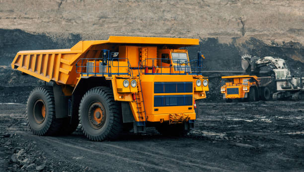 istock A large quarry dump truck in a coal mine. Loading coal into body work truck. Mining equipment for the transportation of minerals. 1306639027