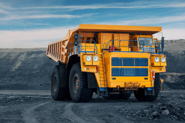 istock A large quarry dump truck in a coal mine. Loading coal into body work truck. Mining equipment for the transportation of minerals. 1306639046