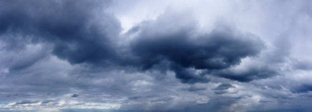 istock Dark rainy clouds in the stormy sky. Wheather forecast. 1306639276