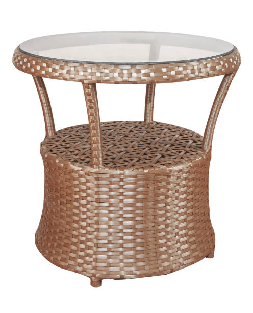 istock Wicker rattan table with glass top. 1306639505