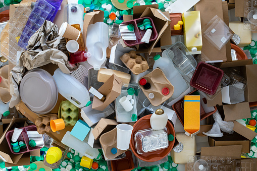 A wide, aerial view of a collection of recyclable materials.