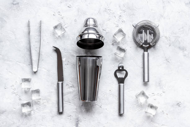 istock Set of bartender tools and accessories with a cocktail shaker 1306644579