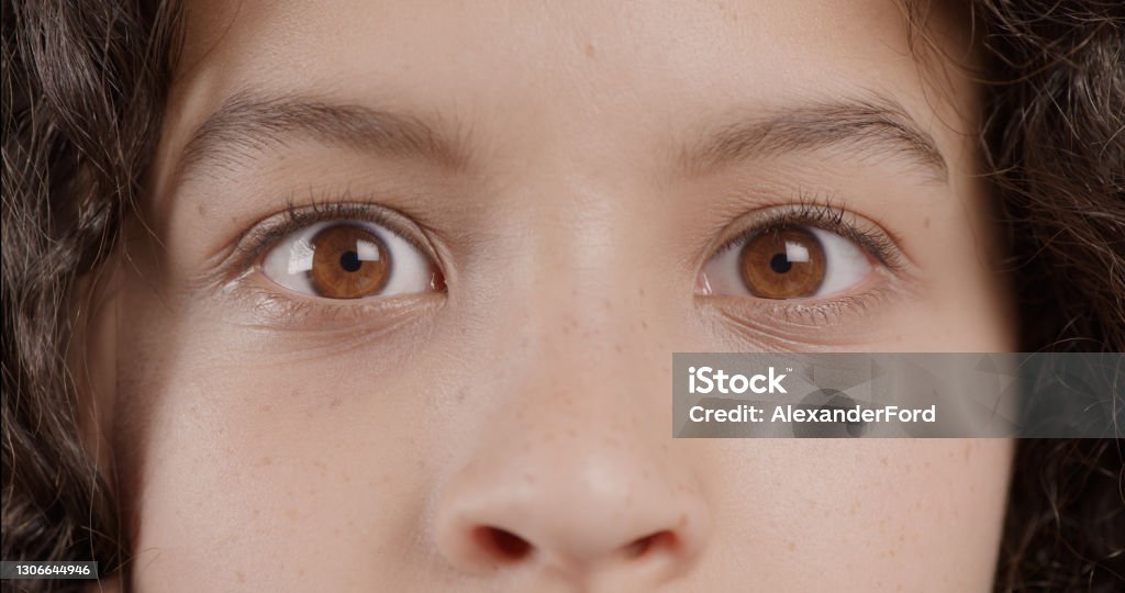 I don't believe my eyes! Cropped shot of a teenage girl’s eyes Eye Stock Photo