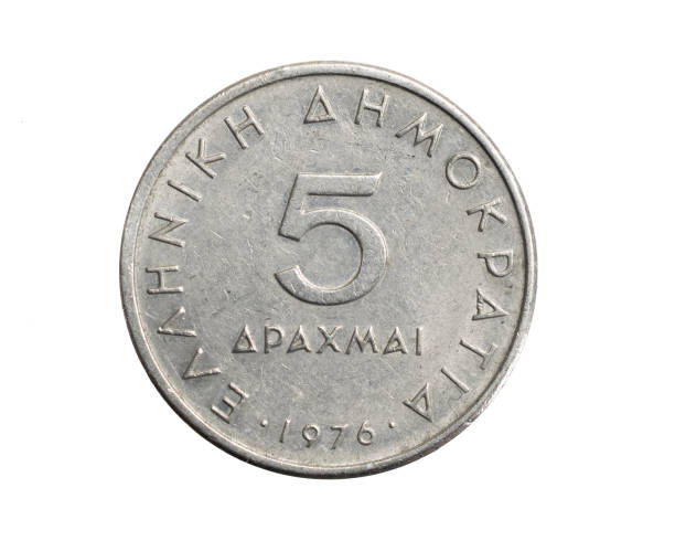 istock Greece five drachma coin on a white isolated background 1306645351