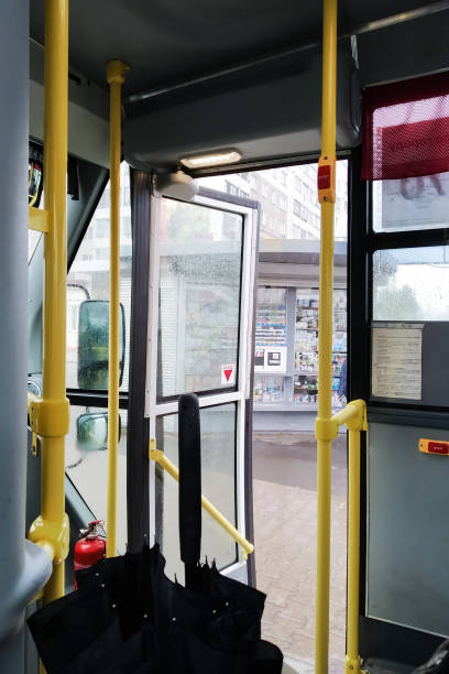 istock Open door of public bus, inside view 1306650233