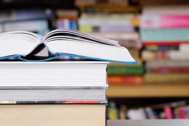 istock Open book close up at the library 1306650393