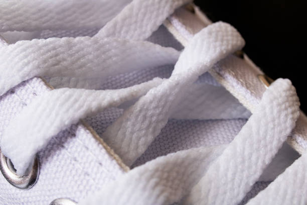 istock Laces on white sneakers close up, macro 1306650498