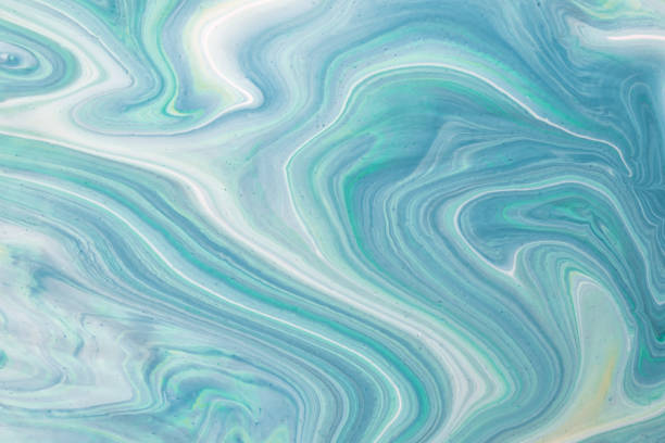 istock Abstract fluid art background light blue and cyan colors. Liquid marble. 1306651569