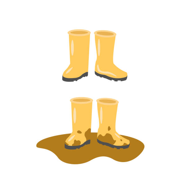 Boots Cute yellow rubber boots with black soles are clean and shining, while others are all in the mud and in a puddle rubber boot stock illustrations