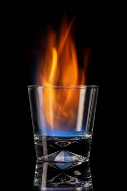 istock fire in a glass sheet on a black background, the element of fire 1306654863