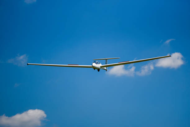 Sailplane flying on the blue sky.