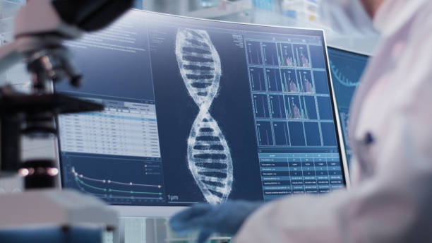 istock Female doctor working in laboratory. Studying DNA samples 1306664731