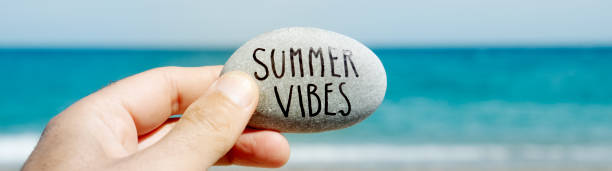 istock text summer vibes in a stone, web banner 1306667789