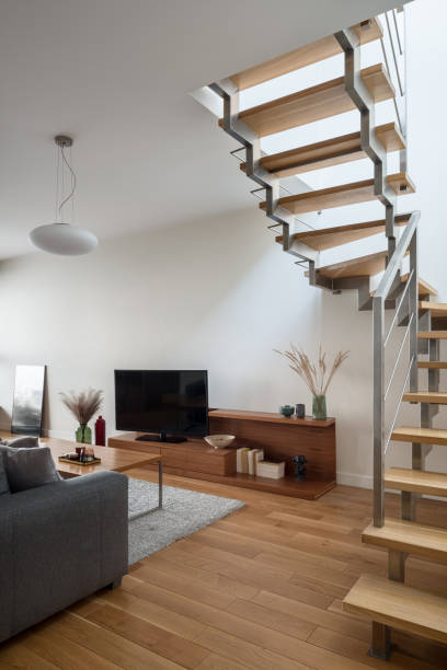 istock Modern living room with stairs 1306668187