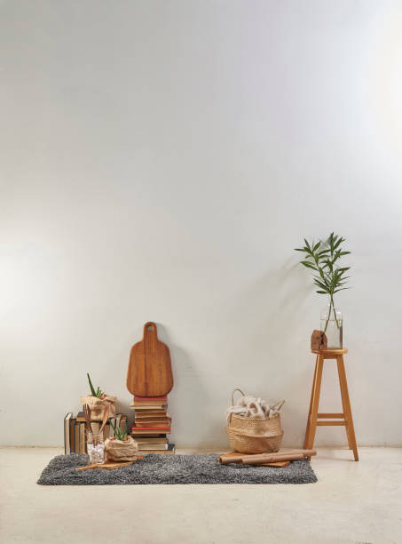 istock modern home living room white wall with wooden stool 1306669271