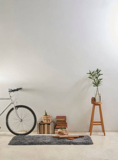 istock modern home living room white wall with wooden stool 1306669307