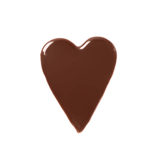 istock Heart made of dark chocolate on white background, top view 1306670113